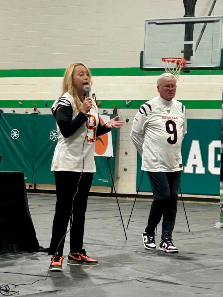 eastern_local_elementary_HBHM_robin_jimmy Robin and Jimmy Burrow speaking at The Joe Burrow Foundation's Healthy Body, Healthy Minds event at Eastern Local Elementary School.